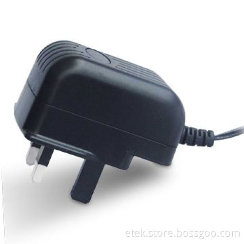 25W Series Switching Power Adapter with UK AC Plug and 90 to 264V AC Input Voltage